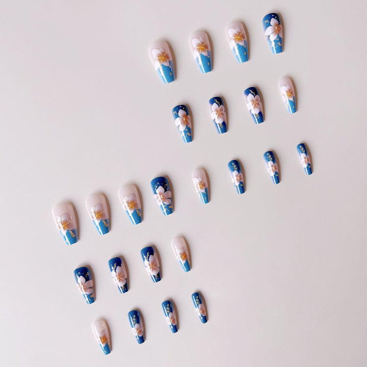 Artificial nail tips with floral accents and glitter Stornfield