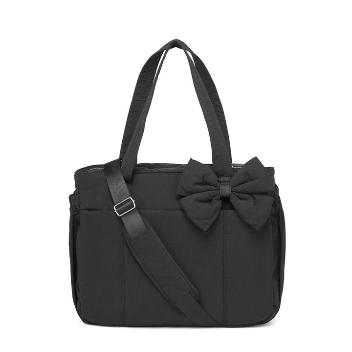 Fashionable tote bag with elegant bow appliqué Stornfield