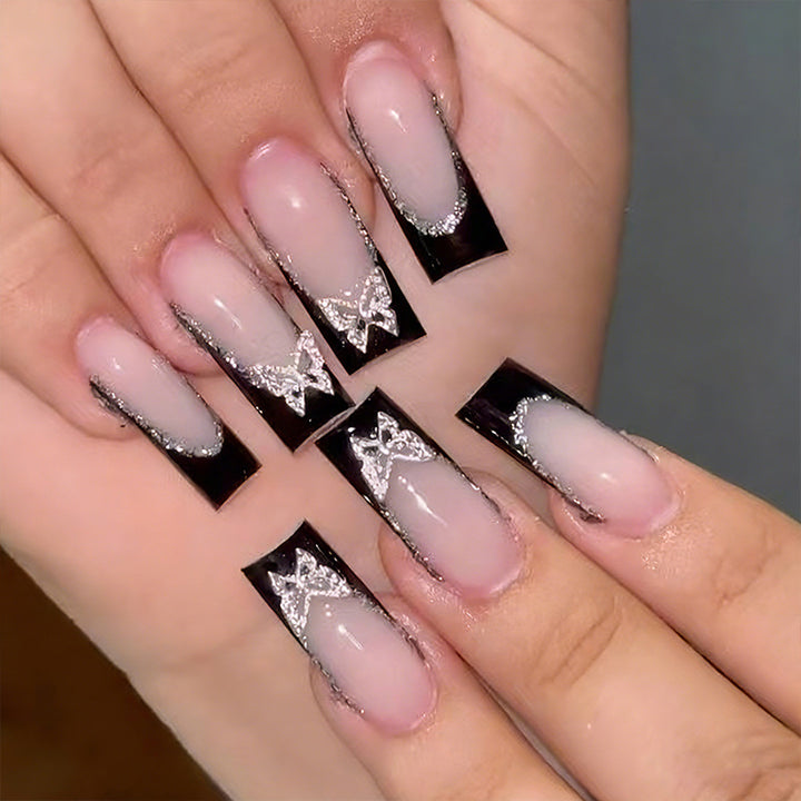 Glamorous artificial nails with detailed decorations Stornfield