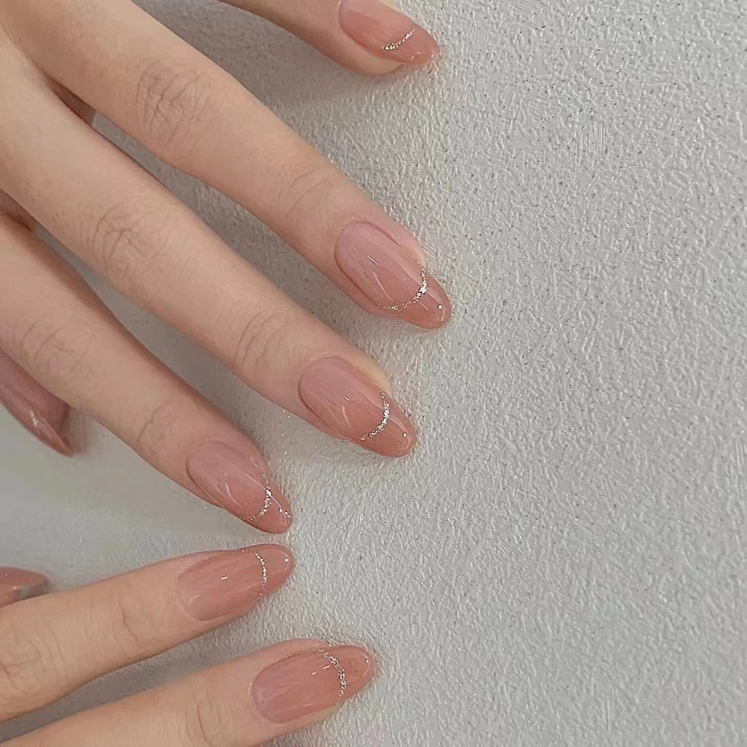 Elegant Press-On Nail Art with Subtle Glitter Accents