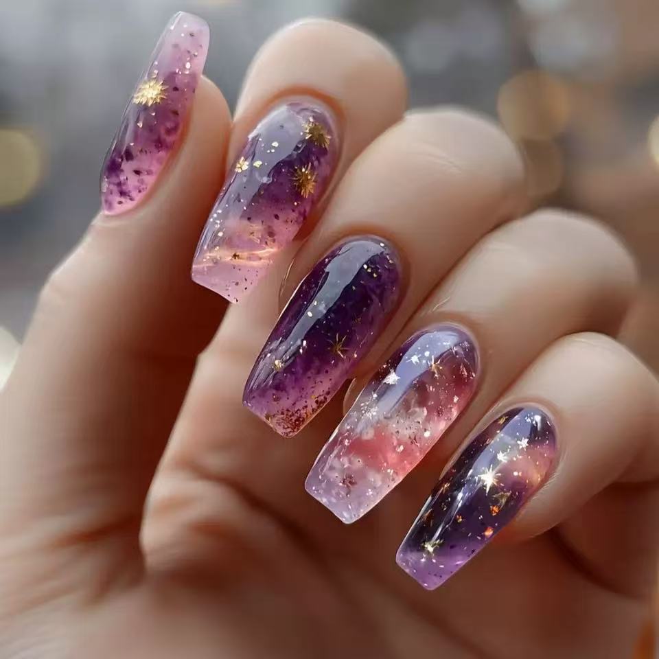 Glittering artificial nail tips in galaxy design Stornfield
