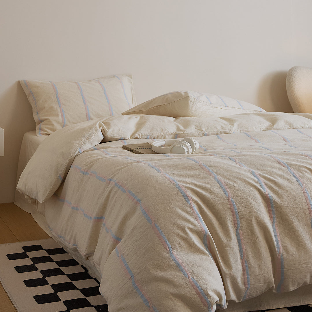 Cotton-linen duvet cover set with brush stroke stripes and airy muslin texture