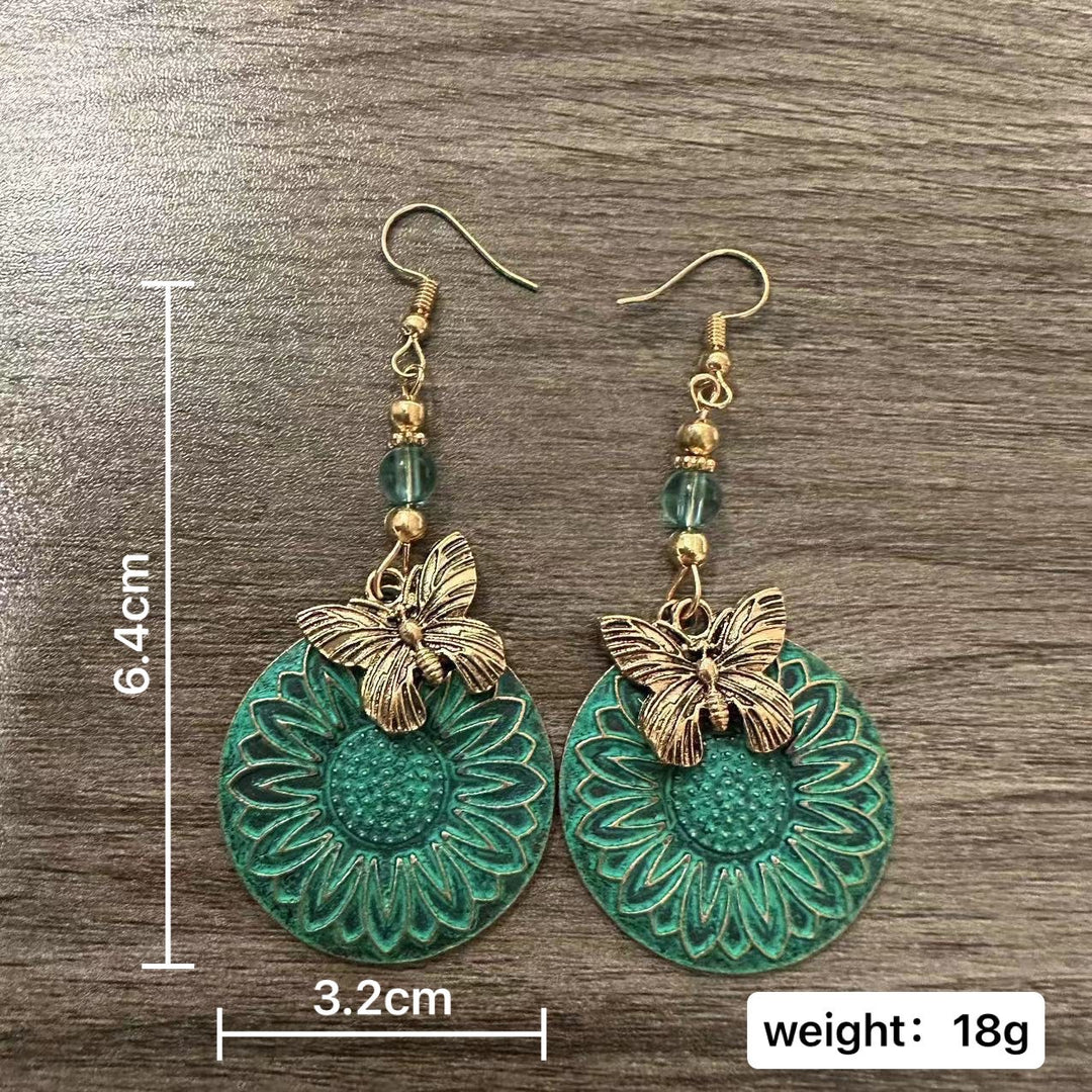 Elegant earrings with floral motif and butterflies Stornfield