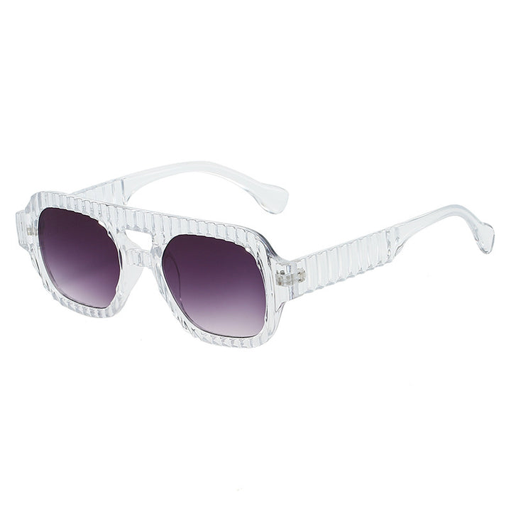 Ladies fashionable sunglasses in futuristic design with textured frame Stornfield
