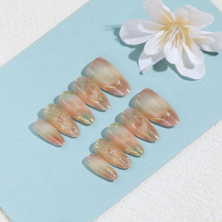 Glittering artificial nails in a modern design Stornfield