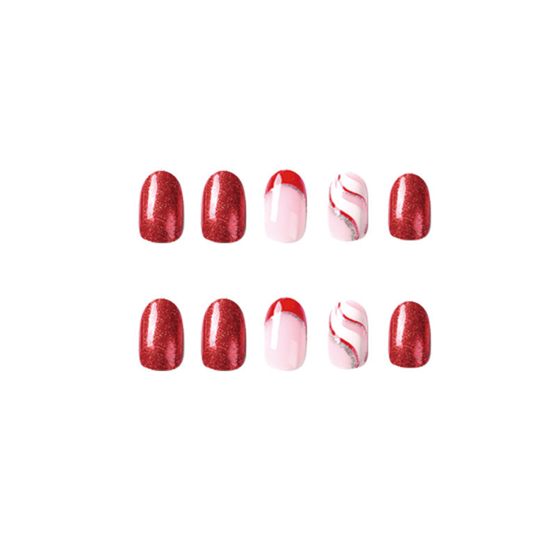 Artful Nail Extensions with Glitter and Wave Pattern Stornfield