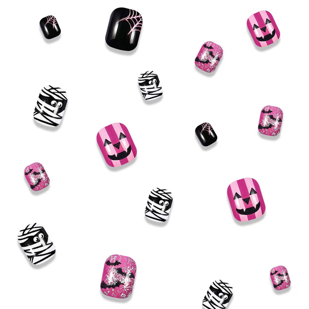 Creative nail art set with Halloween motifs and glitter accents Stornfield