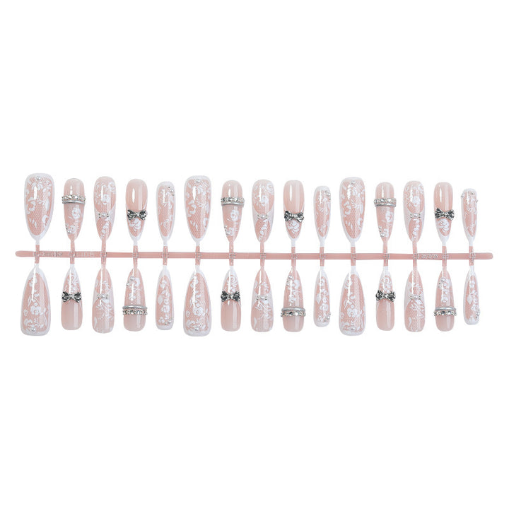Nail art set with intricate accents and glamorous decorations Stornfield