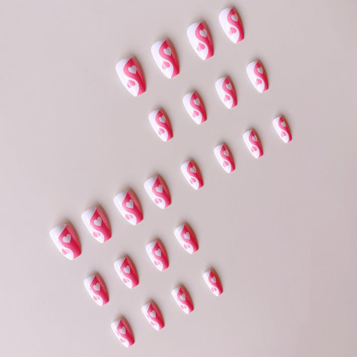 Artificial nails with heart motif and floral accents Stornfield