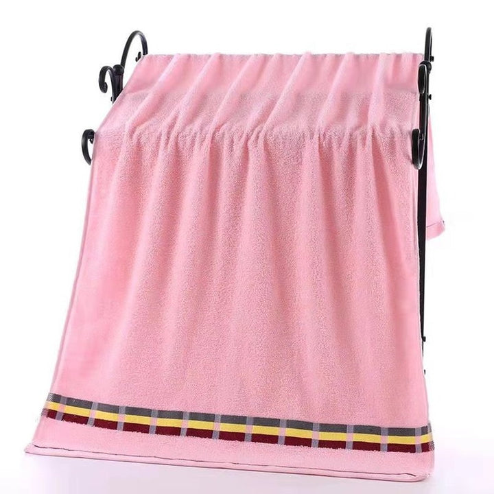 Women’s terry bath towel with elegant striped border Stornfield