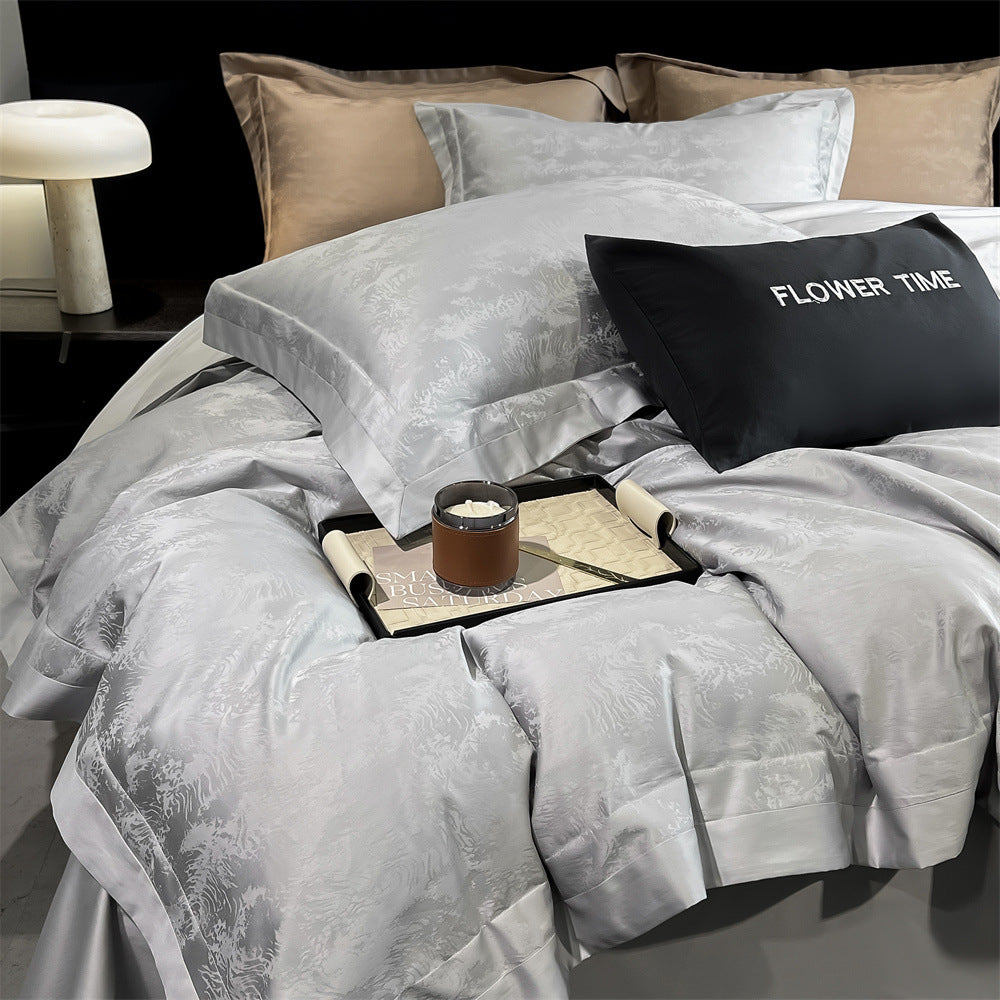 Luxurious cotton satin bedding set with jacquard relief and contrast piping