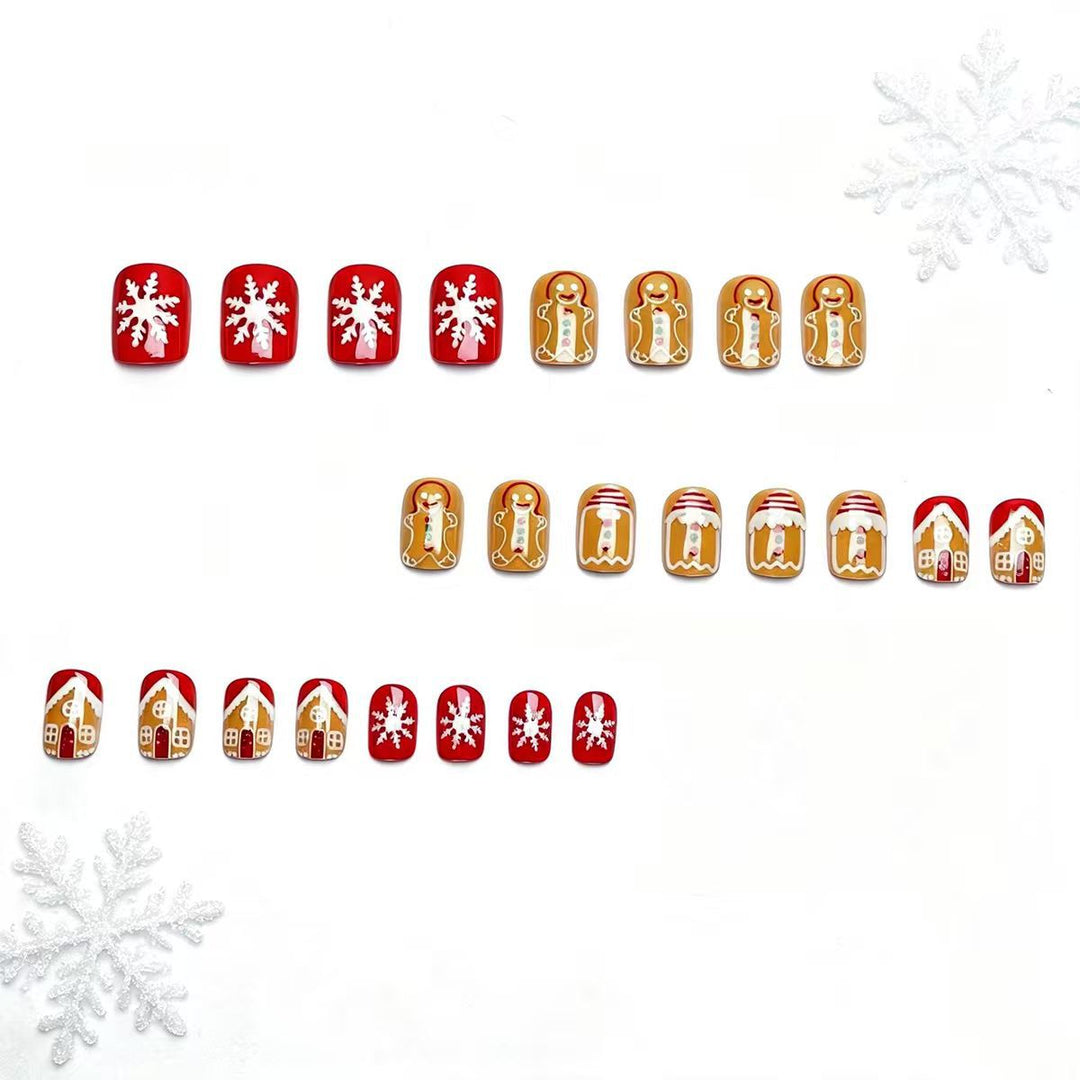 Artificial nails in Christmas gingerbread house design Stornfield