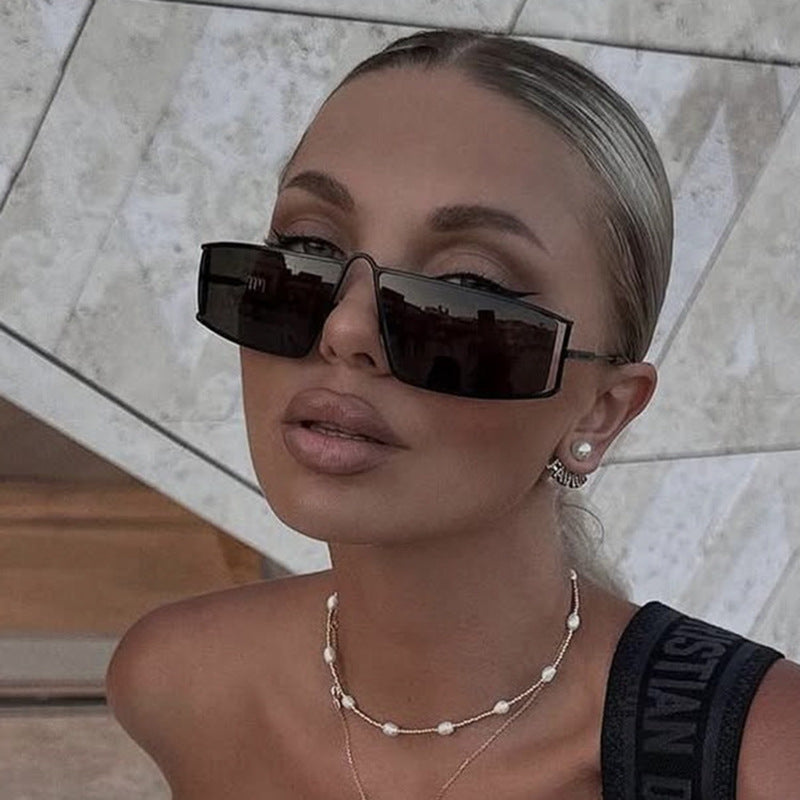 Ladies trendy sunglasses in a futuristic design with square lenses Stornfield