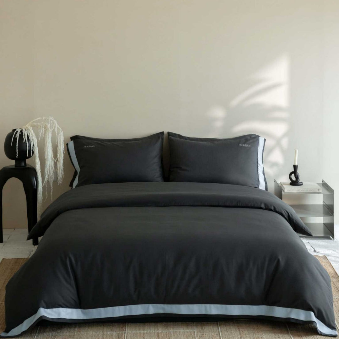 Premium bedding set made of cotton satin with fine cassette trim and hotel closure