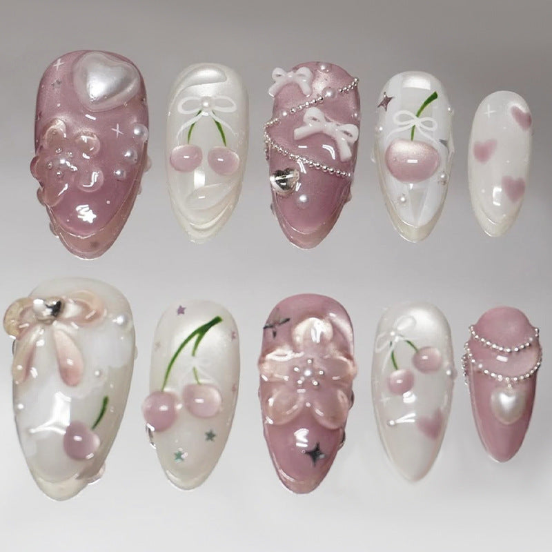 Artificial nail set with decorative floral motifs and glamorous accents Stornfield