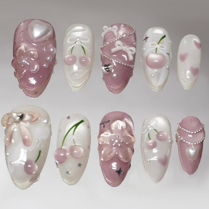 Artificial nail set with decorative floral motifs and glamorous accents Stornfield