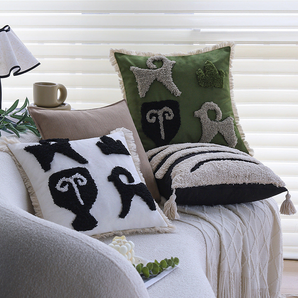 Square decorative cushion cover with hand-tufted ethnic appliqué motif and fringed edge Stornfield