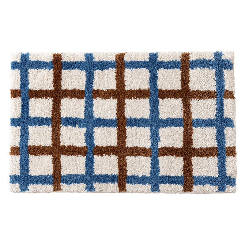 Short pile bath mat with geometric check pattern and non-slip backing Stornfield