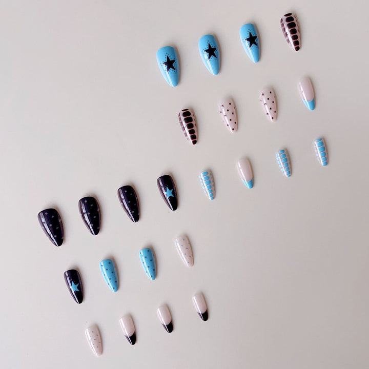 Artificial nail set with creative patterns and playful accents Stornfield