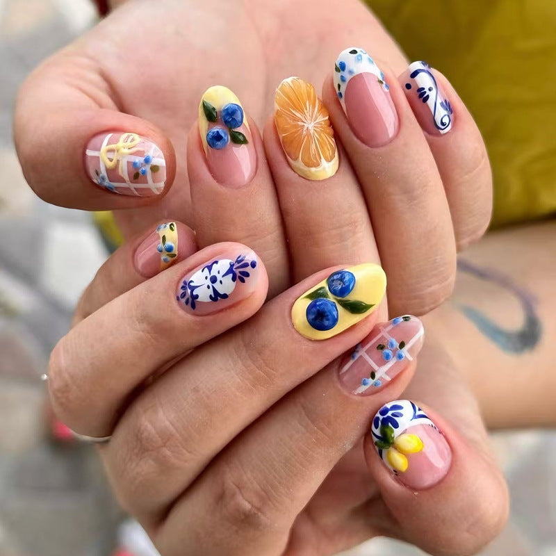 Nail art set with elegant fruit and flower patterns Stornfield