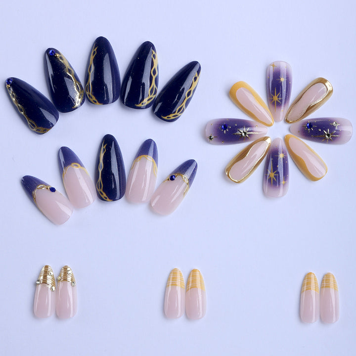 Artificial nails with elegant gold accents Stornfield