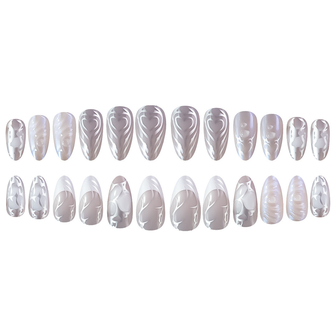 Elegant Stiletto Nail Extensions with Decorative Silver Accents Stornfield