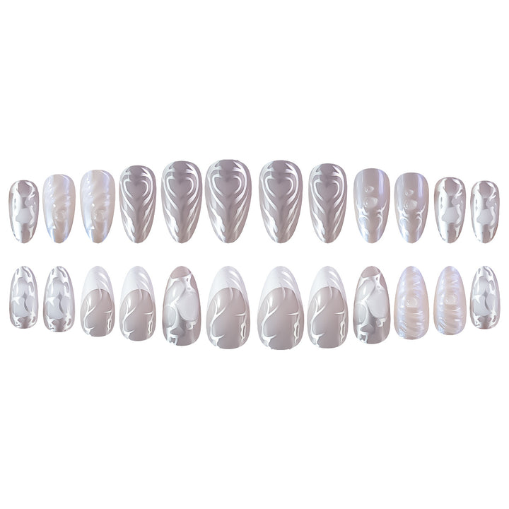 Elegant Stiletto Nail Extensions with Decorative Silver Accents Stornfield