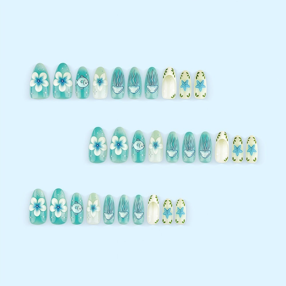 Artificial nails in a maritime design with colorful shell and water motifs Stornfield