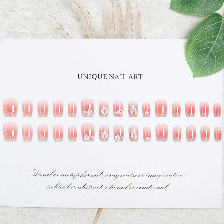Artificial nail set with floral 3D decorations and elegant glitter Stornfield