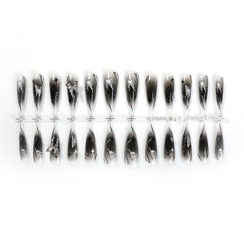 Artificial nail set with elegant, floral design and glitter details Stornfield