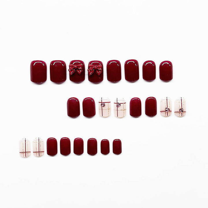 Decorative Press-On Nail Art Extensions with Bow Accents Stornfield