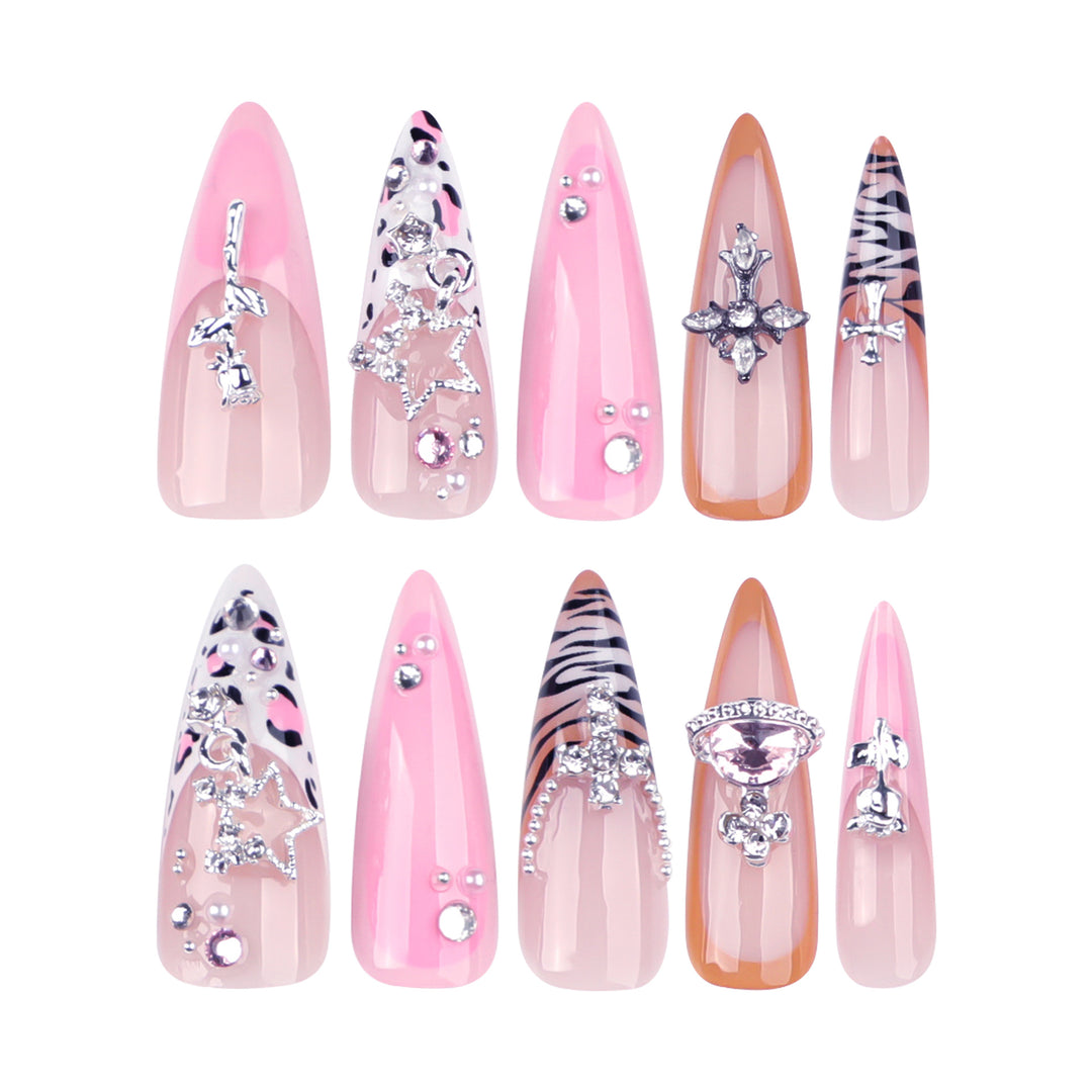 Artful stiletto nails with glitter and rhinestone embellishments Stornfield