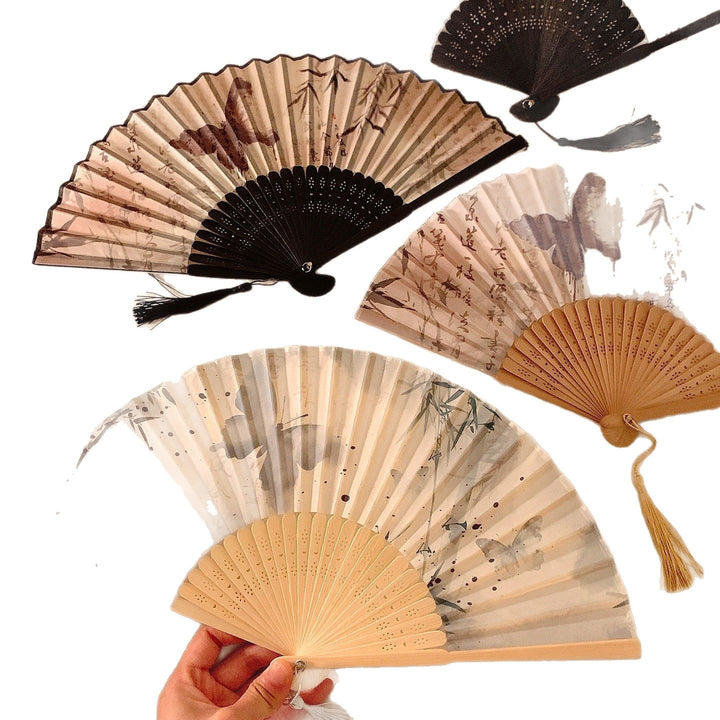 Handcrafted fan with elegant butterfly design Stornfield