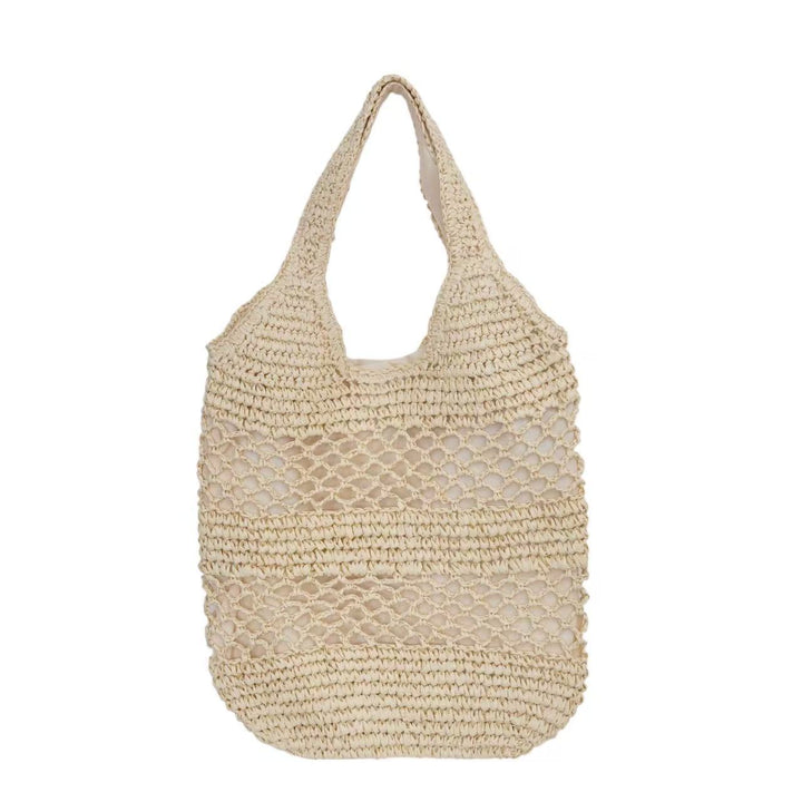 Handbag made of braided natural material with tassel details Stornfield