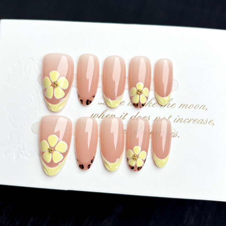 Artistic Press-On Nail Set with Floral Embellishments