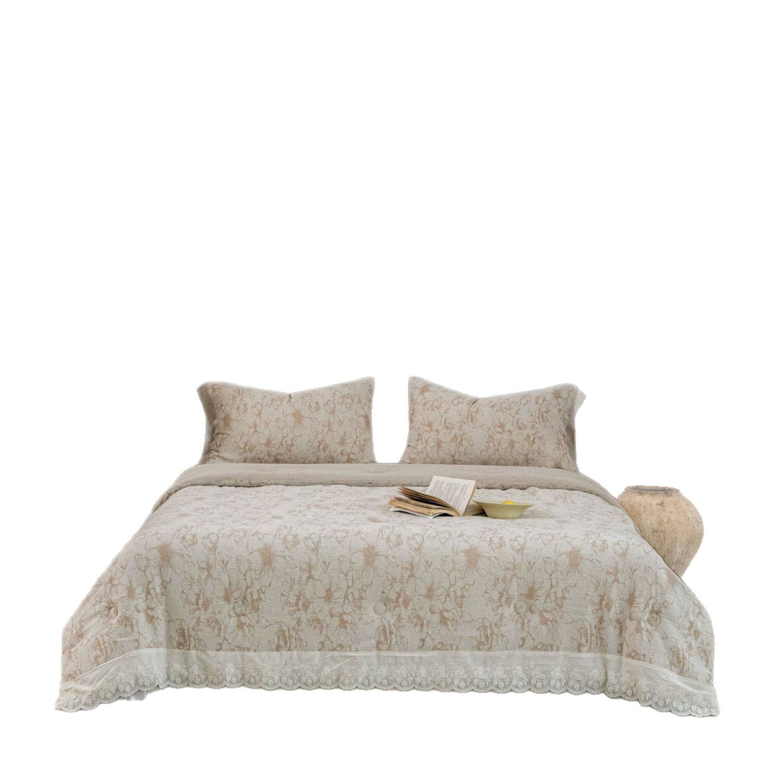 Quilted bedspread and pillowcase set made of cotton-linen with floral jacquard structure and lace edge