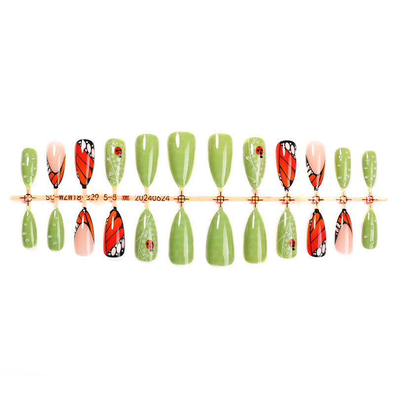 Artistic Press-On Nail Set with Butterfly and Floral Designs Stornfield