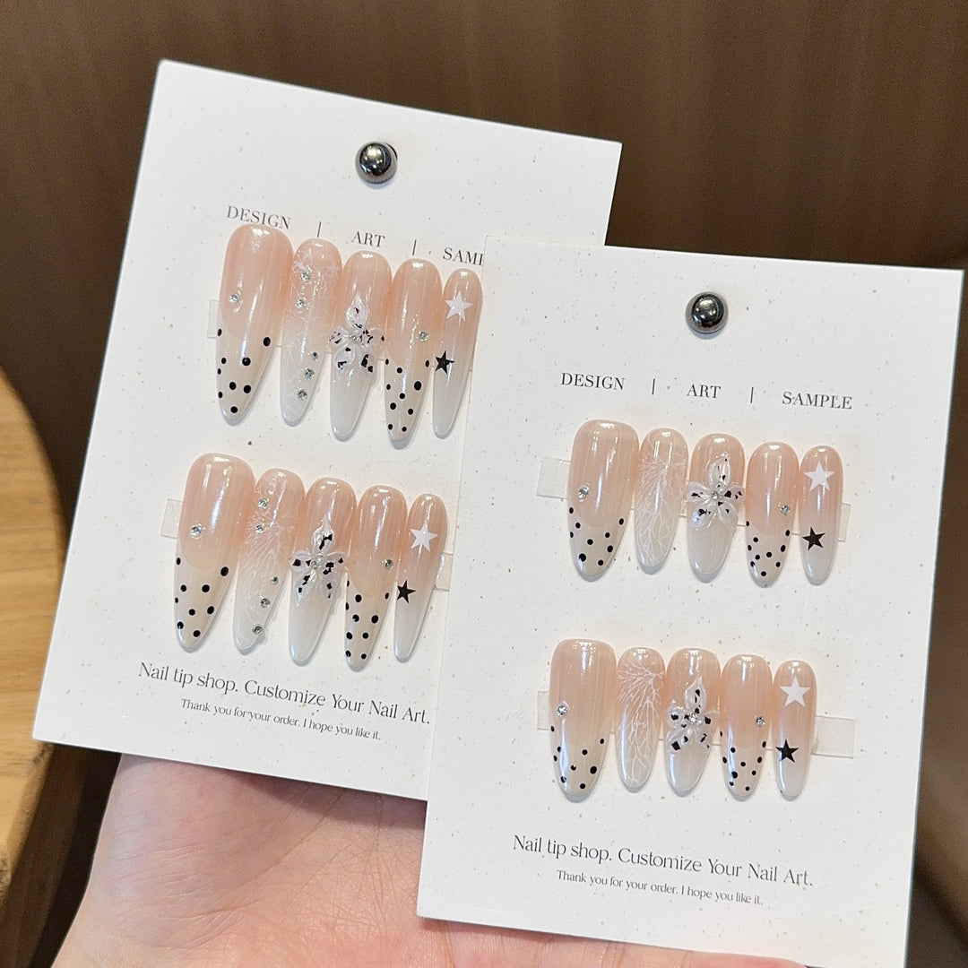 Acrylic Nails Set with Creative Designs and Shimmering Accents Stornfield