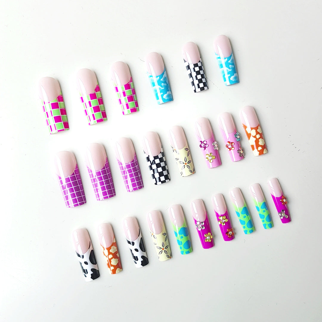 Nail art set with creative designs and shimmering accents Stornfield