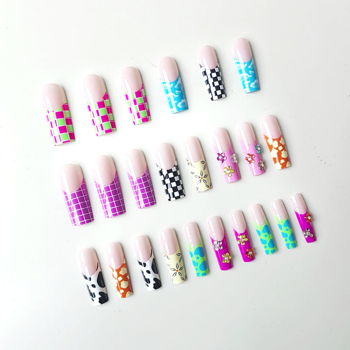 Nail art set with creative designs and shimmering accents Stornfield