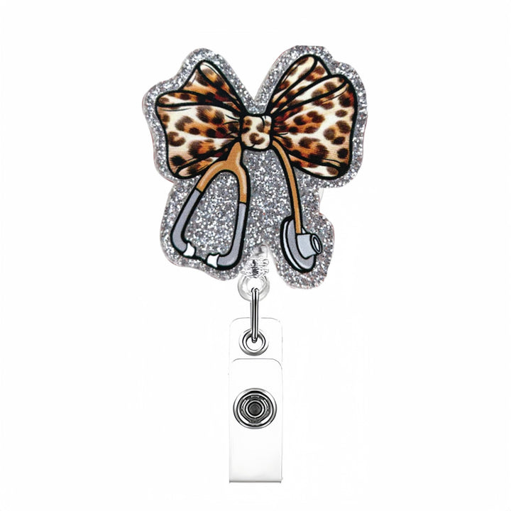 Expandable badge holder with anatomical heart pendant