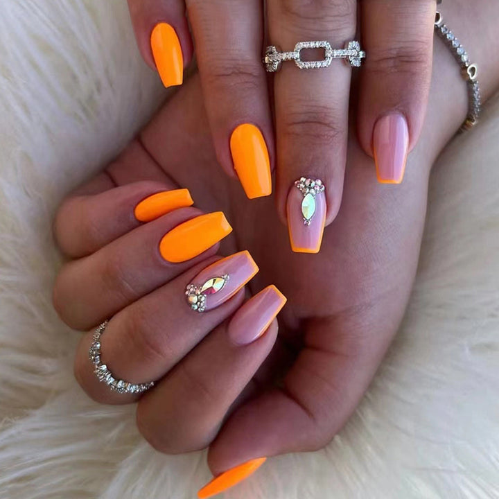Acrylic nail set with trendy neon colors and rhinestone accents Stornfield