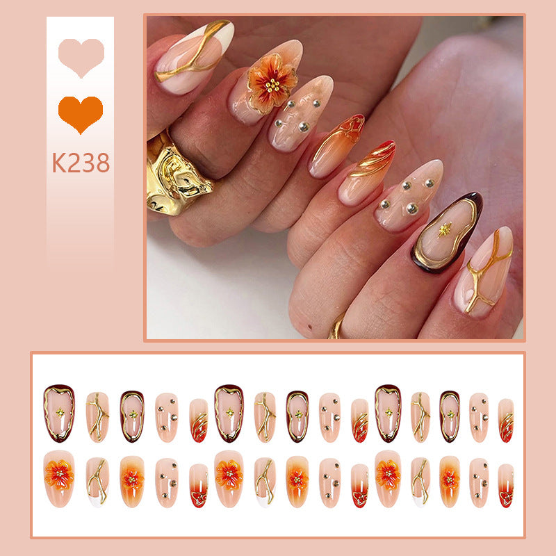 Nail art set with floral accents and glitter elements Stornfield