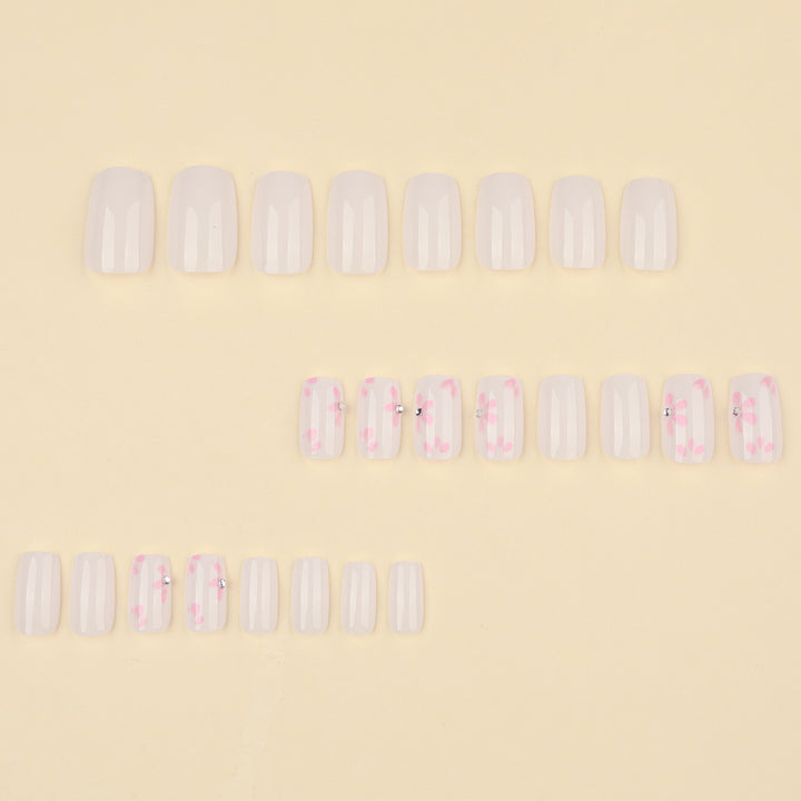 Artful Nail Art with Delicate Flower Patterns Stornfield