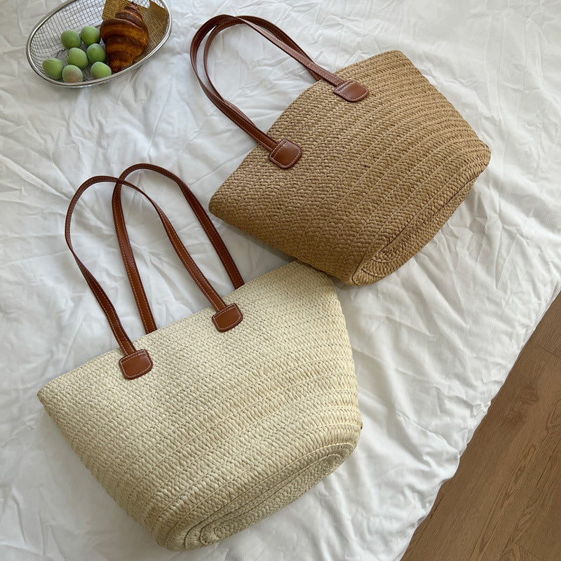 Handcrafted straw bag with elegant leather handles Stornfield