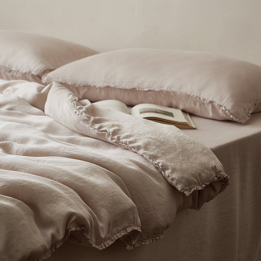 Linen bedding set with ruffled hem
