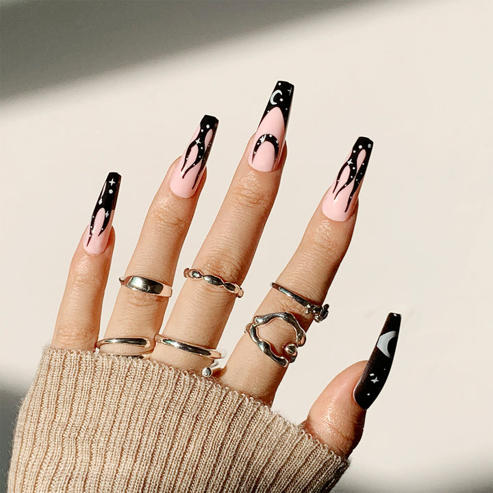 Artistic Nail Extensions with Creative Design and Glittering Accents Stornfield