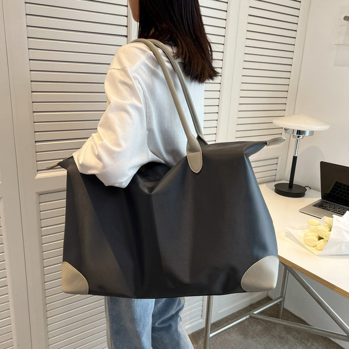 Large travel bag with durable material and multiple compartments Stornfield