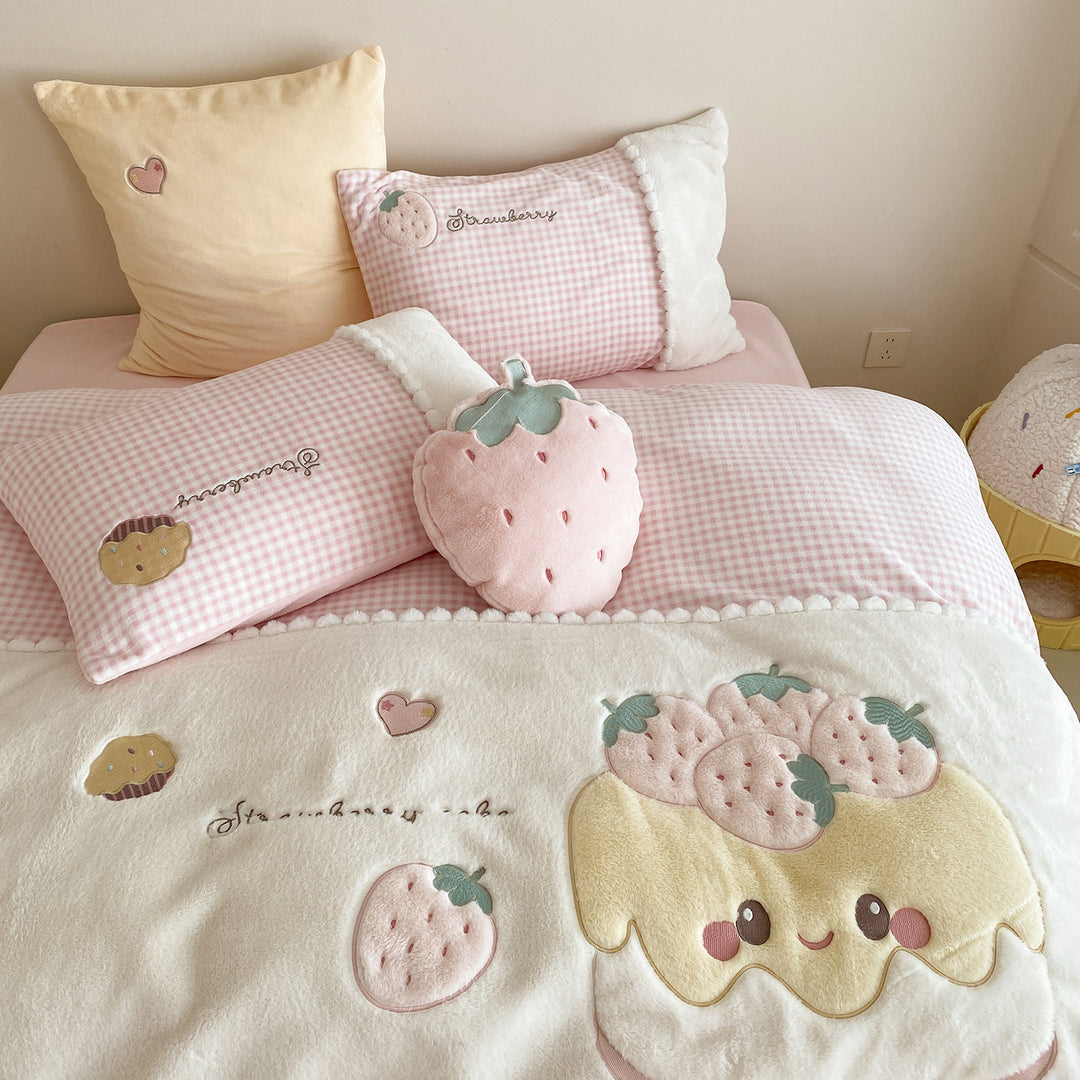 Children's bedding set with embroidered strawberry appliqué, cuddly reversible cover and Vichy check