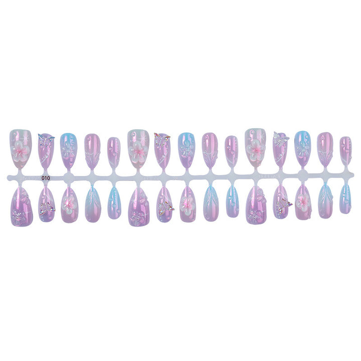 Creative nail art set with delicate flower and glitter details Stornfield